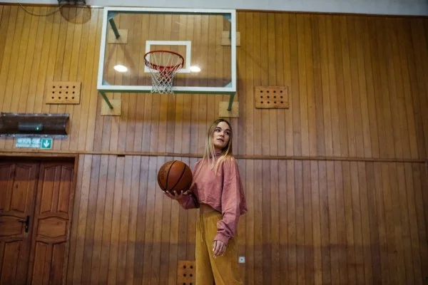 young basketball player training